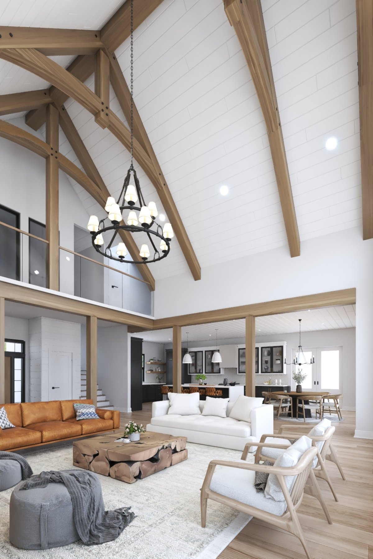 A bright and airy living room featuring high ceilings with wooden beams, large windows, and a stylish chandelier